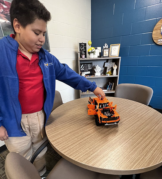 Student with his robotic truck
