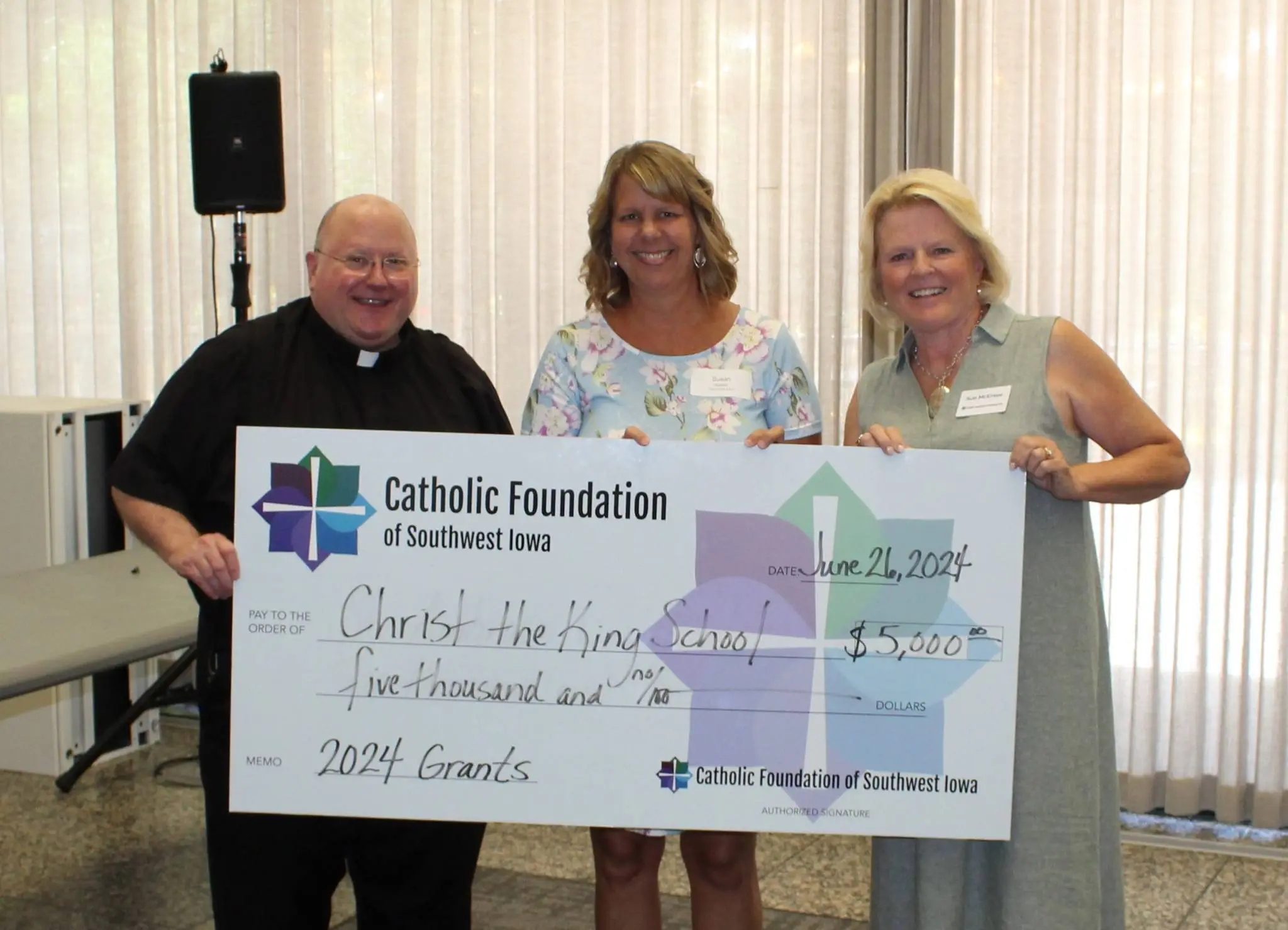 Teachers from Christ the King accepting grant from CFSWIA Teachers from Christ the King accepting grant from CFSWIA
