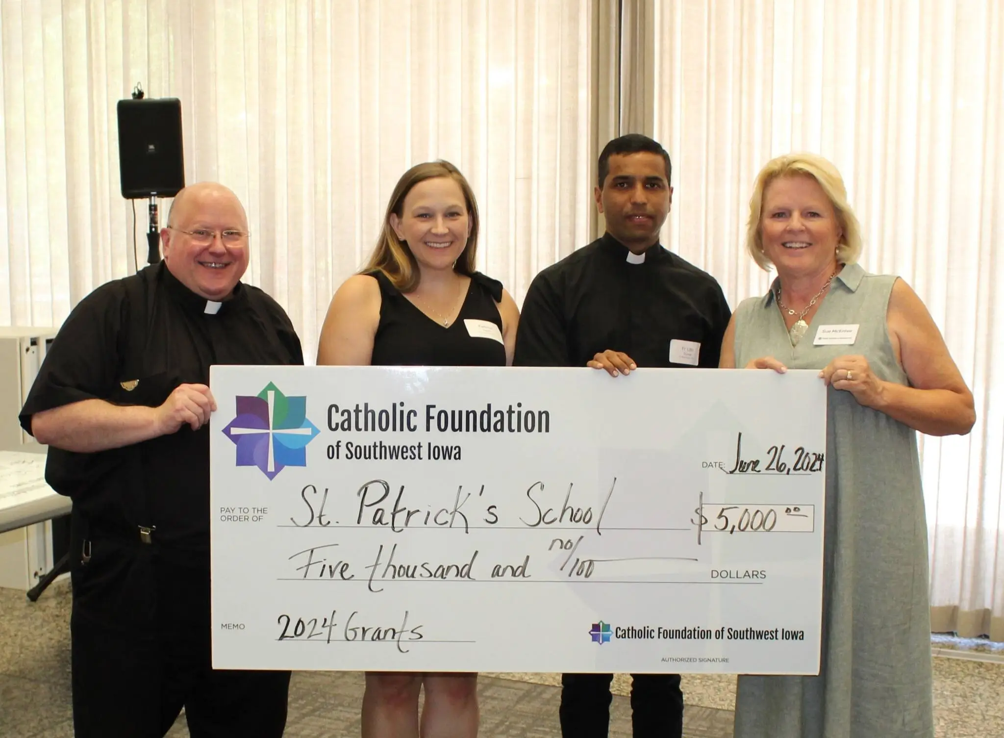 Teachers from St. Patrick in Perry accepting grant from CFSWIA Teachers from St. Patrick in Perry accepting grant from CFSWIA