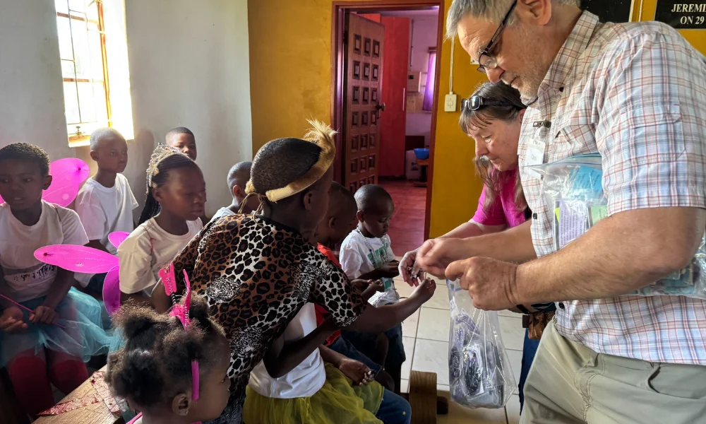 The St. Francis team handing out rosaries at St. Omaar Catholic Church The St. Francis team handing out rosaries at St. Omaar Catholic Church