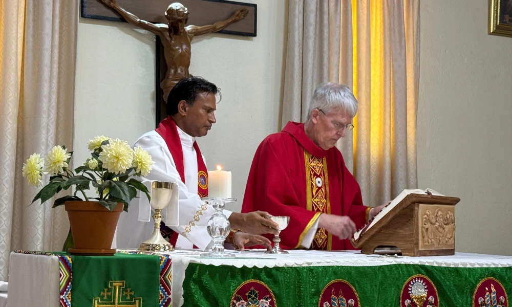 Father Ray McHenry saying Mass at a chapel in South Africa. Father Ray McHenry saying Mass at a chapel in South Africa.