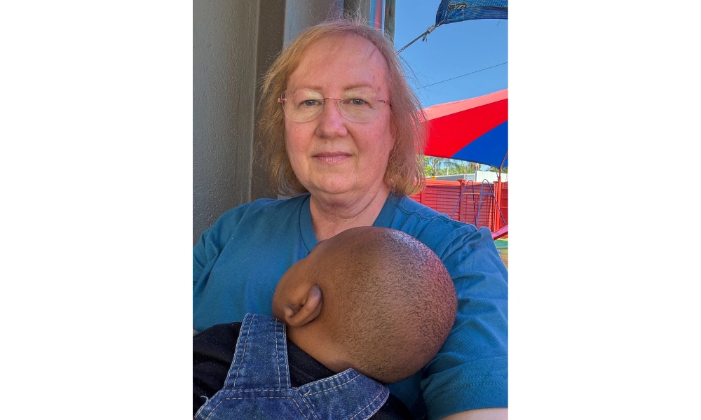 Anne Marie holding young Untoo Anne Marie holding young Untoo