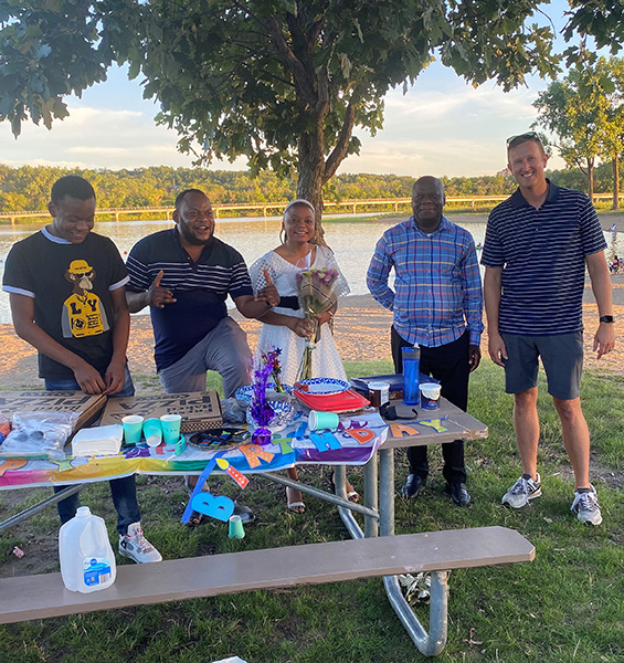 The Kongulu family and the Kurth family at a picnic