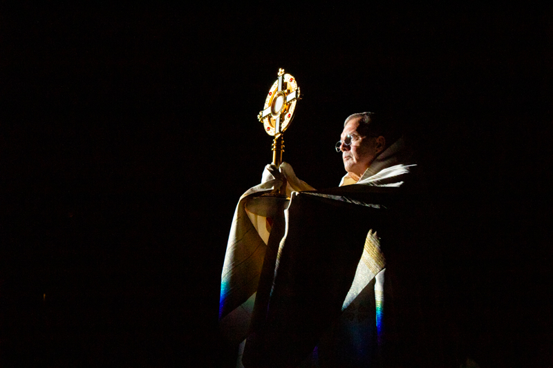 Bishop William Joensen presents the monstrance during the Eucharistic procession at the 2026 Christ Our Life Conference. 