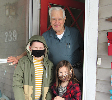 Children with Monsignor Robert Chamberlain