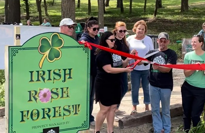 Crowd gathers for a ribbon-cutting ceremony celebrating