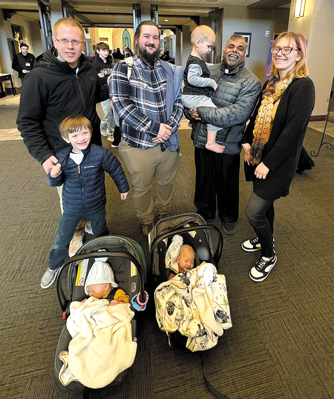 Johnathan Manchester surrounded by family and supporters