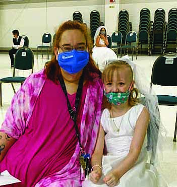 Mother and daughter at First Communion