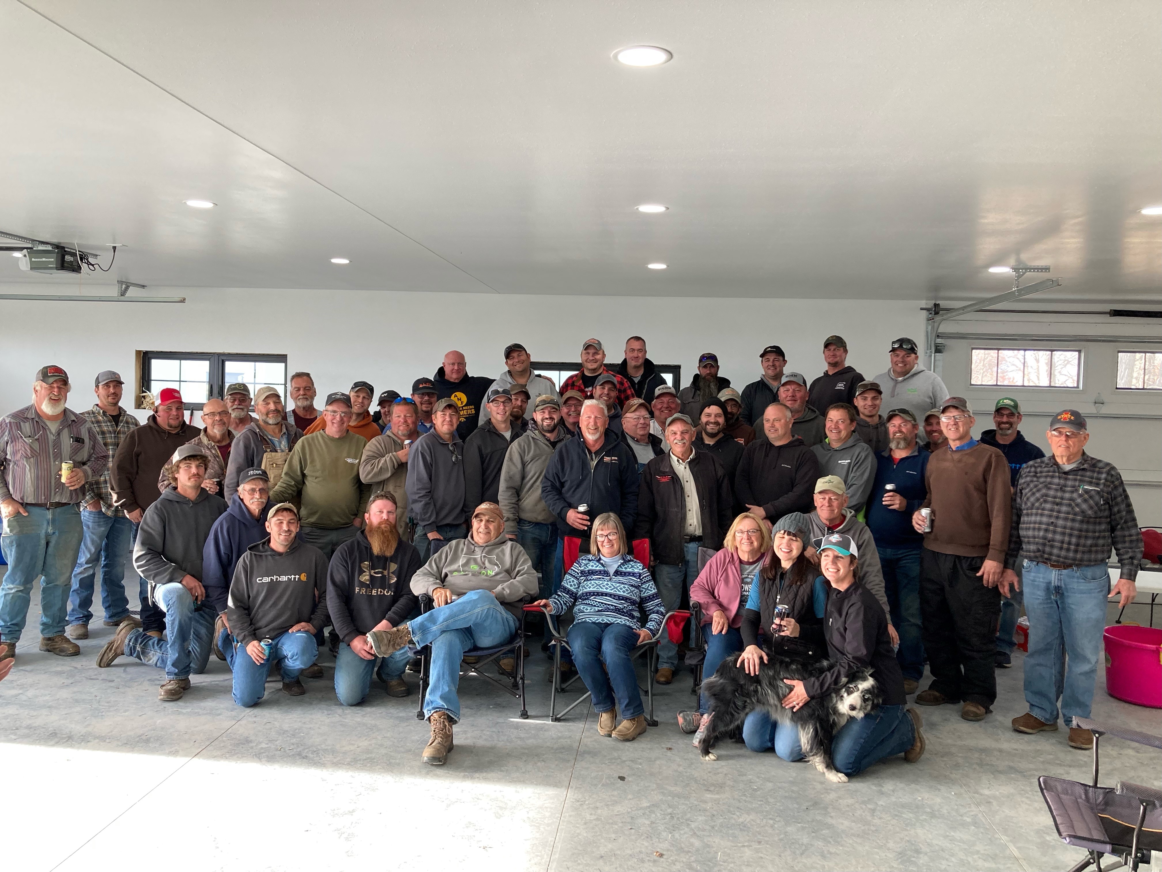 Crowd of neighbors who helped harvest