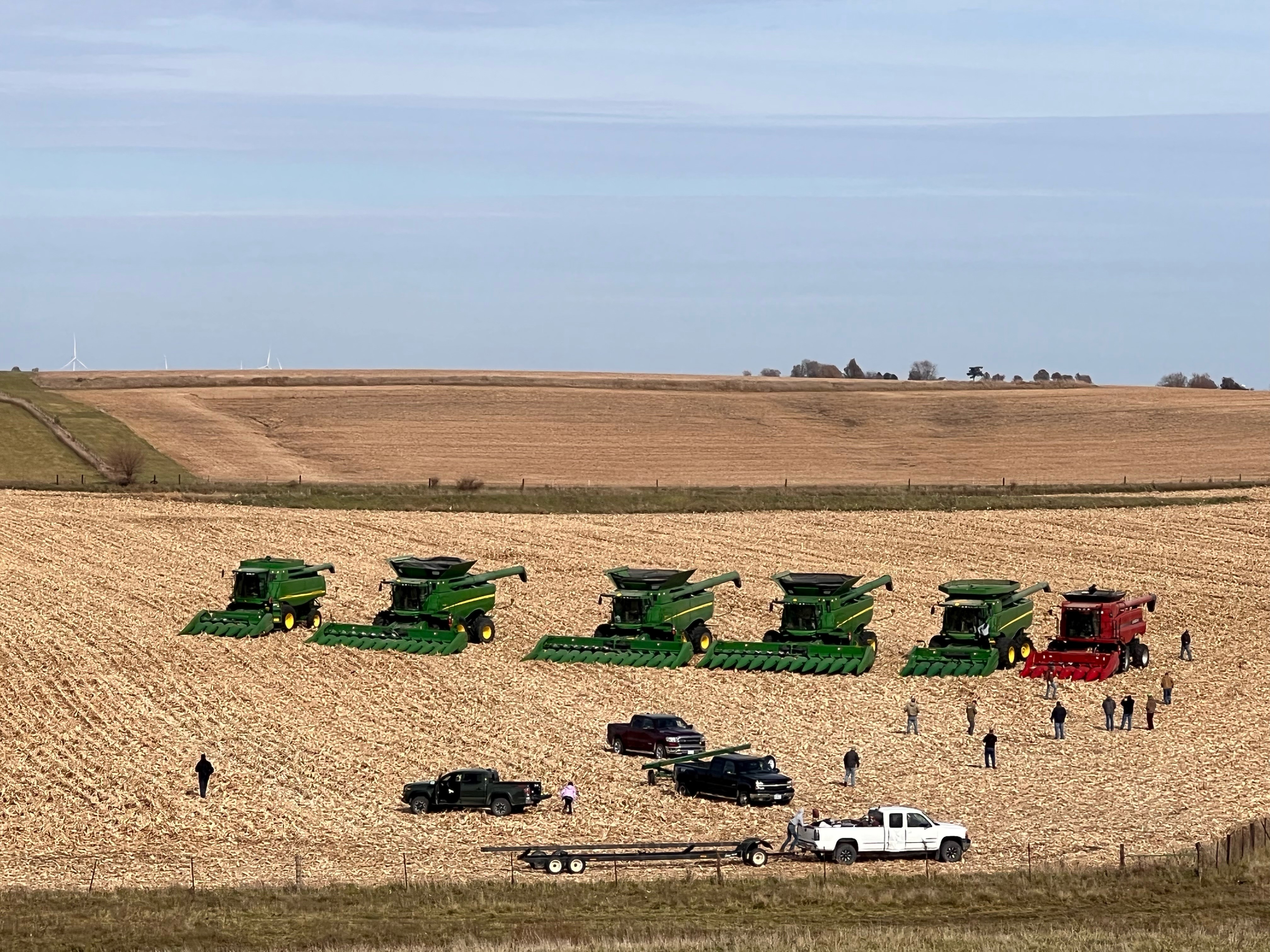 Late farmer's field being harvested