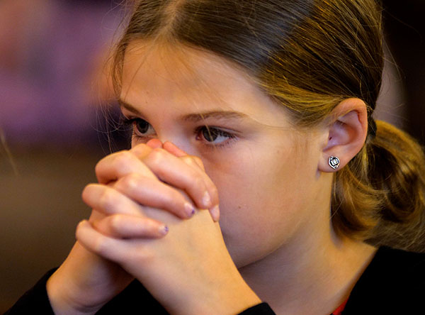 Girl at Saint Mary Church in Hamburg, Iowa