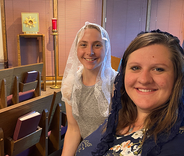 Two women at adoration at Holy Rosary Parish