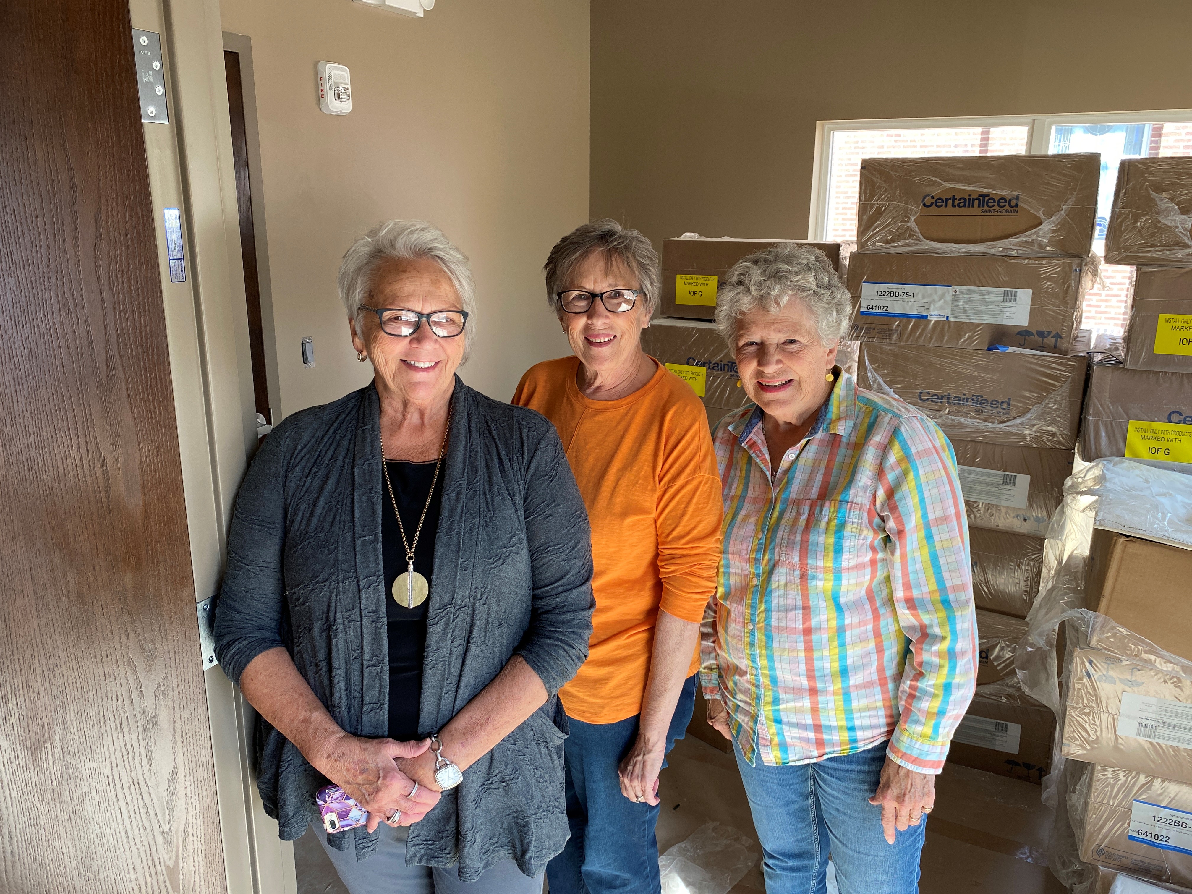 Three organizers at St. Mary Parish in Hamburg