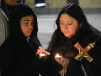 Mother and son at prayer service