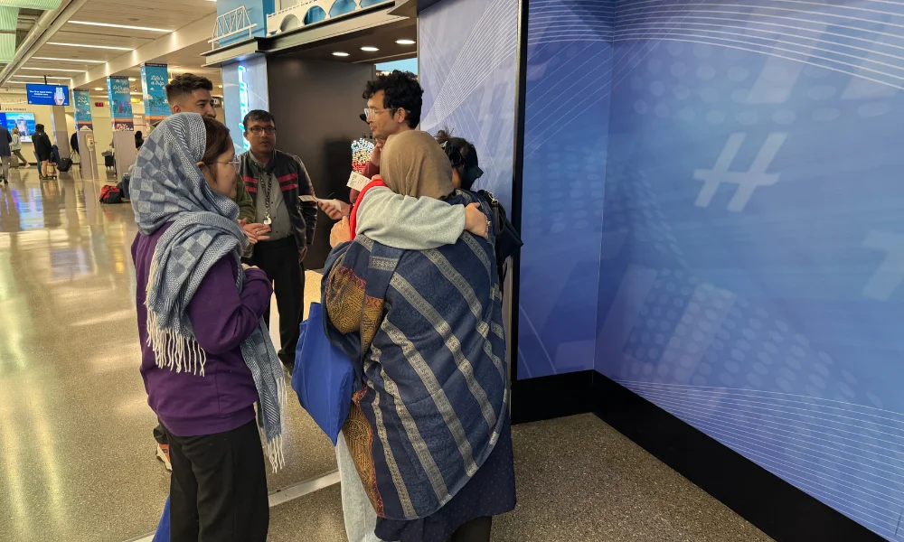 Reunion of a refugee family at the DSM International Ai