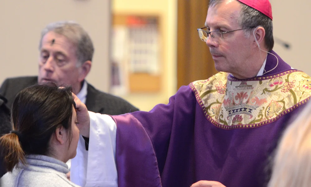 Bishop Joensen distributing ashes on Ash Wednesday Bishop Joensen distributing ashes on Ash Wednesday