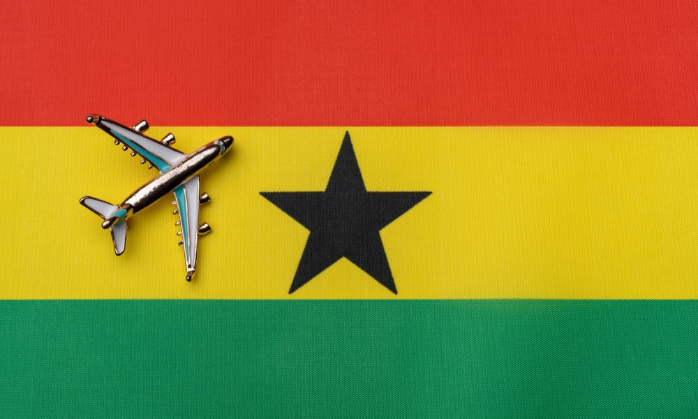 Flag of Ghana with an airplane pin