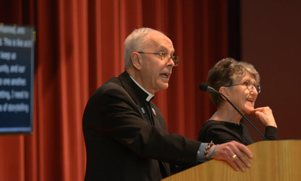 Bishop Seitz speaking at Sheslow Auditorium at Drake Un