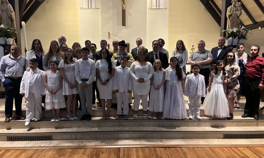 The 2025 OCIA program at Christ the King included children from their school and parish programs. The 2025 OCIA program at Christ the King included children from their school and parish programs.