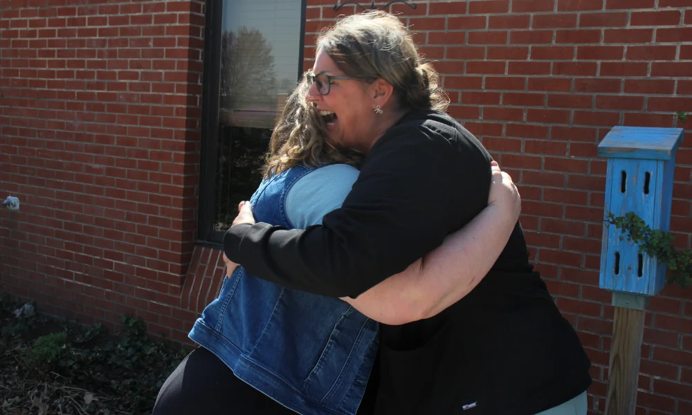 Jen Witt hugging Liz Brott, who performed the heimlich maneuver on her son, Abram. Jen Witt hugging Liz Brott, who performed the heimlich maneuver on her son, Abram.
