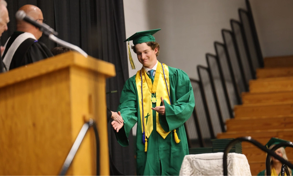 Owen Marshall receiving his high school diploma Owen Marshall receiving his high school diploma