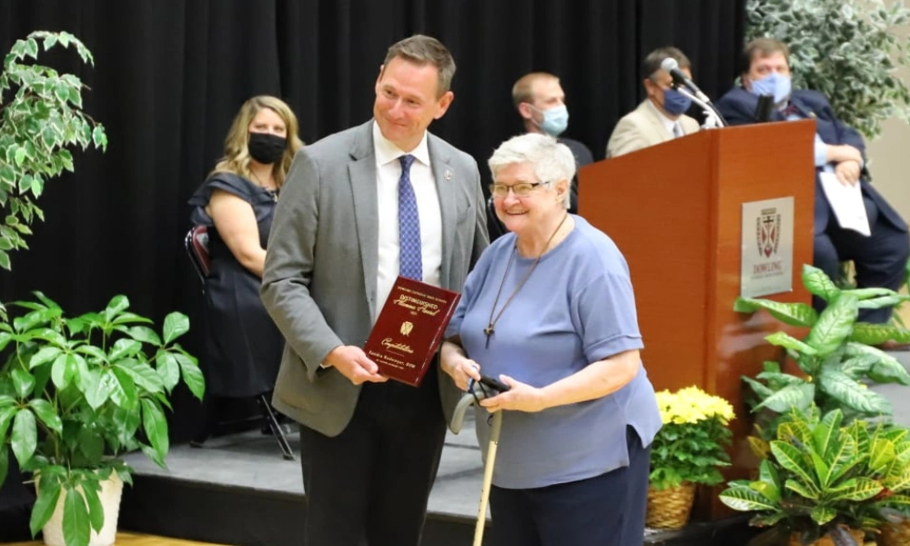 Sister Sandy receiving the Dowling Distinguished Alumni