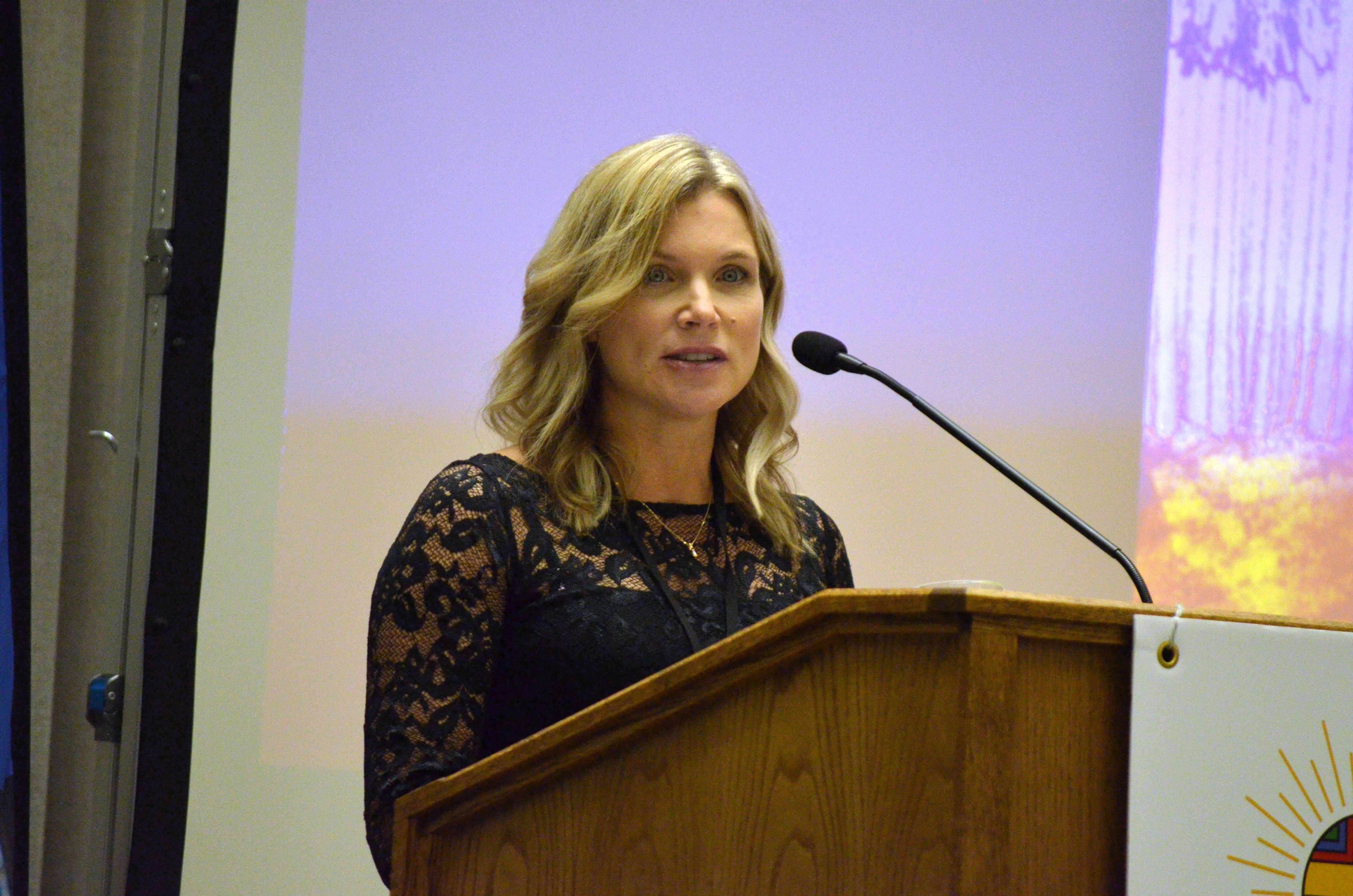 Dr. Brandy Ficek speaks at the 2025 Bishop's Celebratio