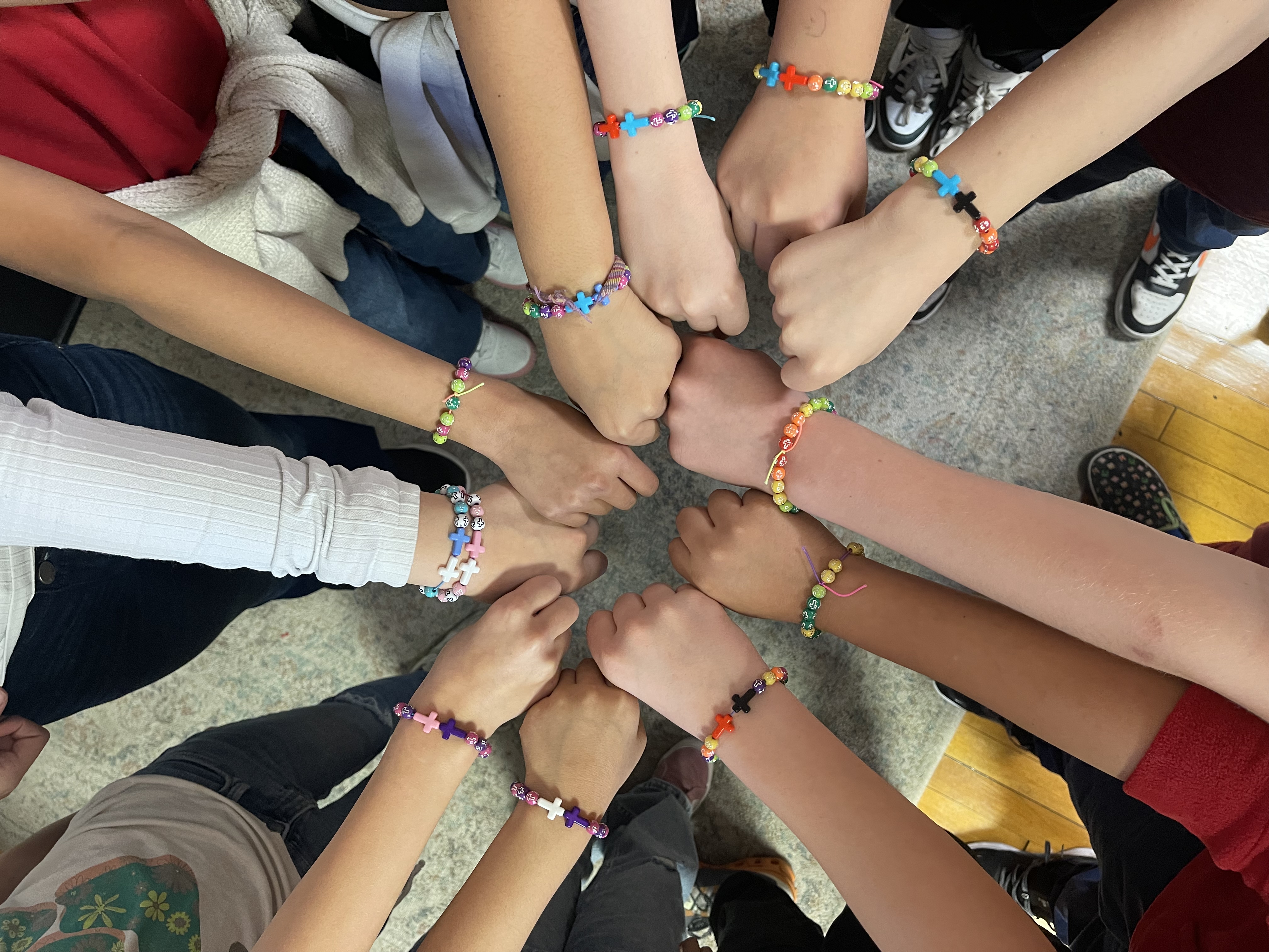St. Patrick students show their friendship bracelets, c