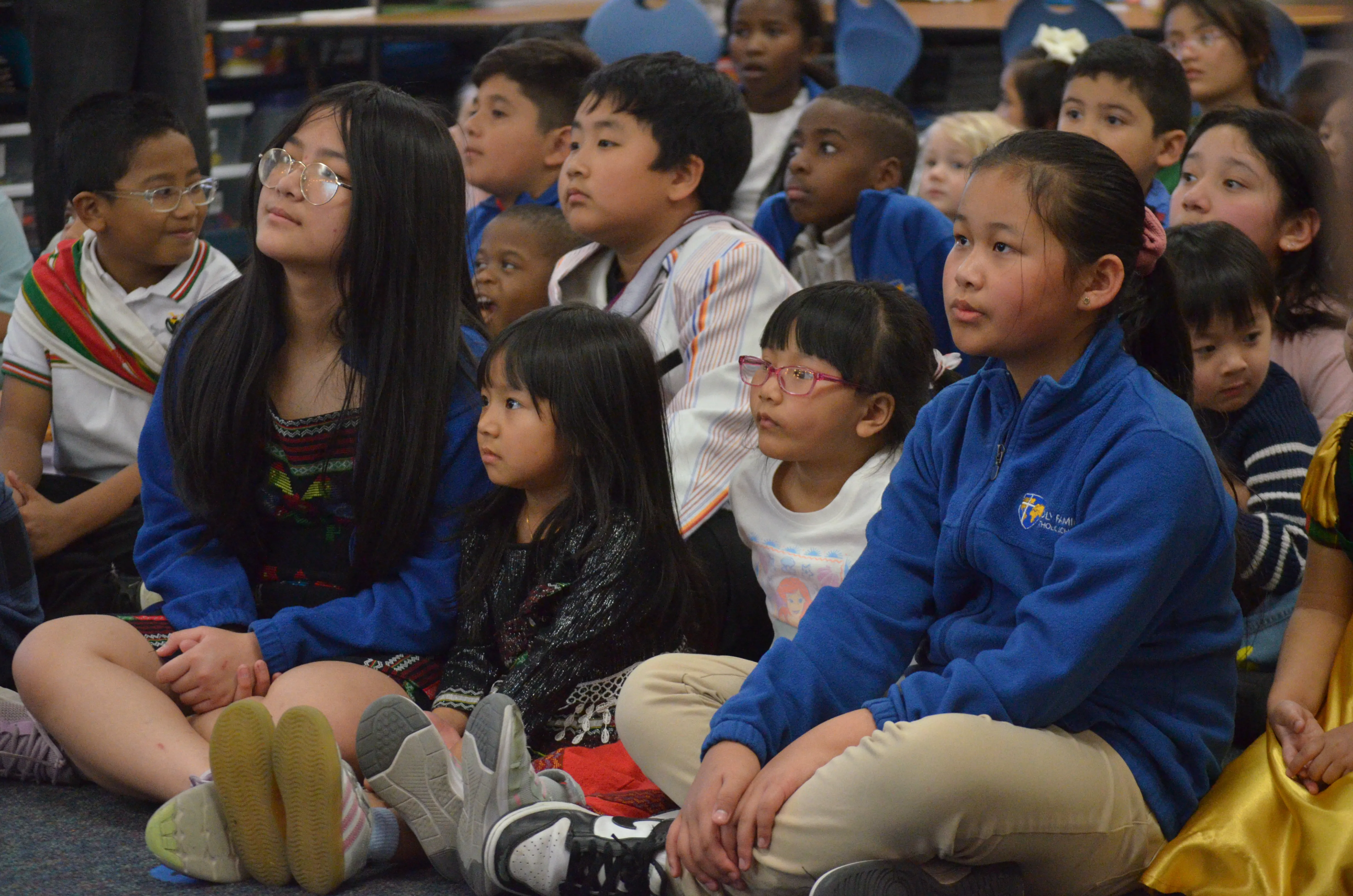 Students attend Culture Day presentations at Holy Family Catholic School in Des Moines