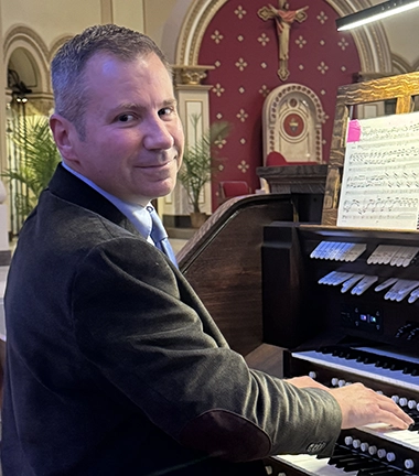 Mark Thomas, Ph.D. leads music at St. Ambrose Cathedral in Des Moines