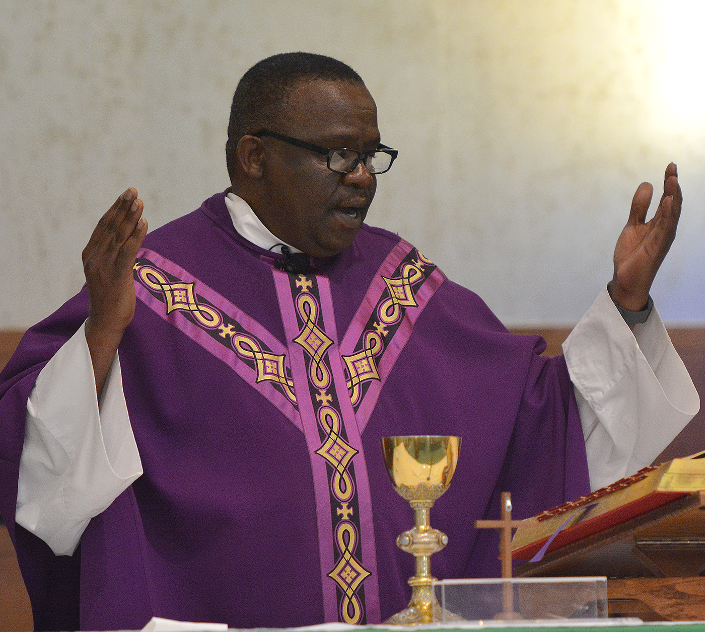 Father Lazarus Kirigia celebrates Mass